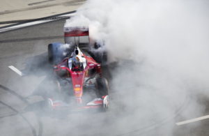 Sebastian Vettel making donuts at the Daytona International Speedway. [Photo by Thomas Murray]