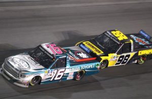 Austin Hill (16) races Grant Enfinger (98) during the NASCAR Gander Outdoors Truck Series NextEra Energy 250 at Daytona International Speedway. [Jerry Markland/Getty Images]