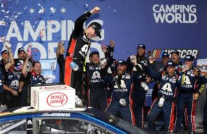 Alex Bowman celebrates in Victory Lane after winning the Monster Energy NASCAR Cup Series Camping World 400 at Chicagoland Speedway. [Credit: Matt Sullivan/Getty Images]