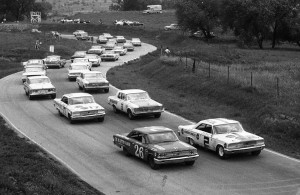 The field is lined up ready to go at Meadowdale for the scheduled 250-mile USAC Stock Car race. Row one has the 1963 Fords of Don White #2 and Curtis Turner #26. Row two is occupied by Norm Nelson #3 and Harry Heuer #17. [Photo by Russ Lake]