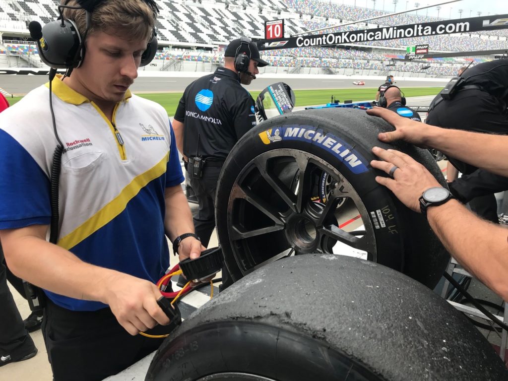 Checking the Michelin tires. [Eddie LePine Photo]