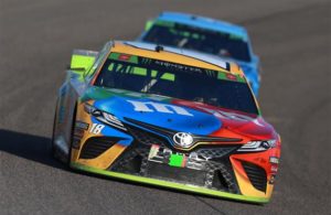 Kyle Busch leads Kevin Harvick during the Monster Energy NASCAR Cup Series Ford EcoBoost 400 at Homestead Speedway. [Sean Gardner/Getty Images]