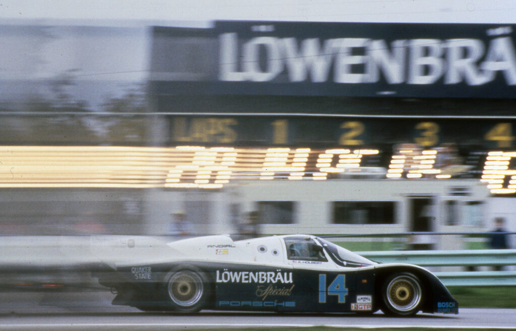 Al Holbert passing the old barn, 1985. [Photo by Jack Webster]