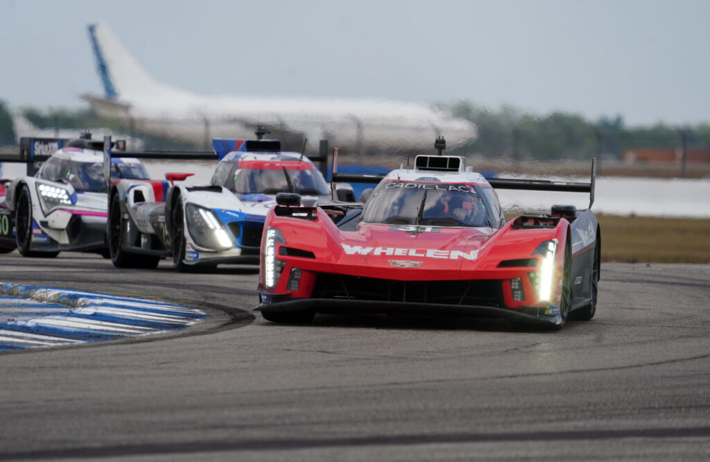 Overall winning Cadillac followed by second place BMW GTP. [Jack Webster Photo]