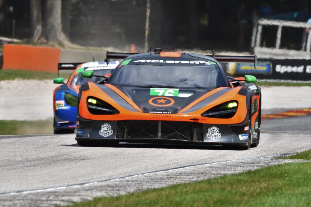 Mclaren under pressure out of Turn 6. [John Wiedemann Photo]