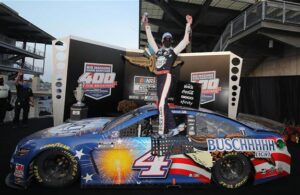 Kevin Harvick celebrates in Victory Lane after winning the NASCAR Cup Series Big Machine Hand Sanitizer 400 Powered by Big Machine Records at Indianapolis Motor Speedway. [Credit: Chris Graythen | Getty Images]