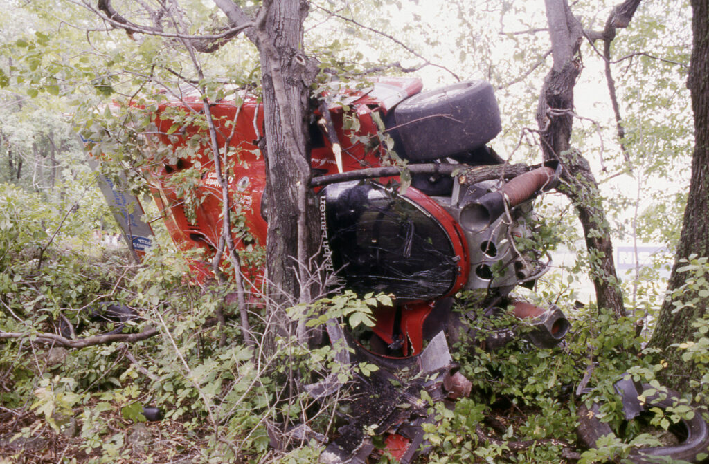 Coke Porsche 962 in the trees outside of Turn 6, 1985. [Photo by Jack Webster]