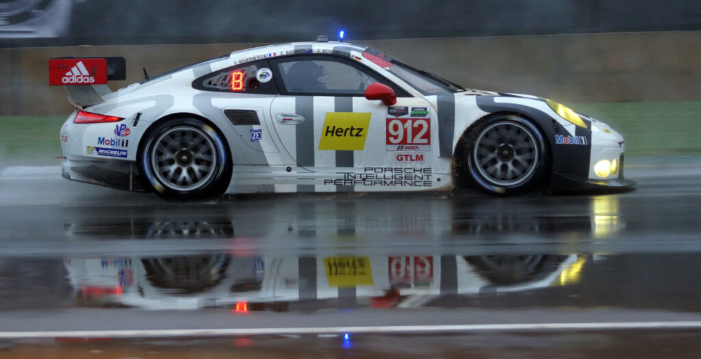 Porsche had success at the wet Petit Le Mans in 2015, with #912 finishing 4th in class and #911 winning class and finishing first overall. [Jack Webster photo]