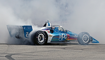 Josef Newgarden celebrates a $1 million win at Road America. [Pete Gorski photo]