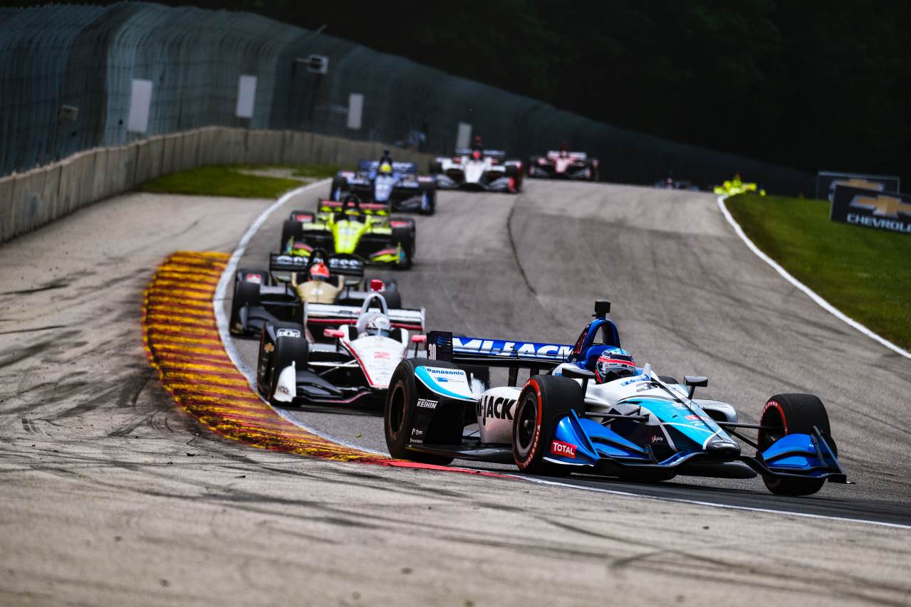 Takuma Sato leads a group through turn 5 at Road America. © [Jamie Sheldrick/ Spacesuit Media]