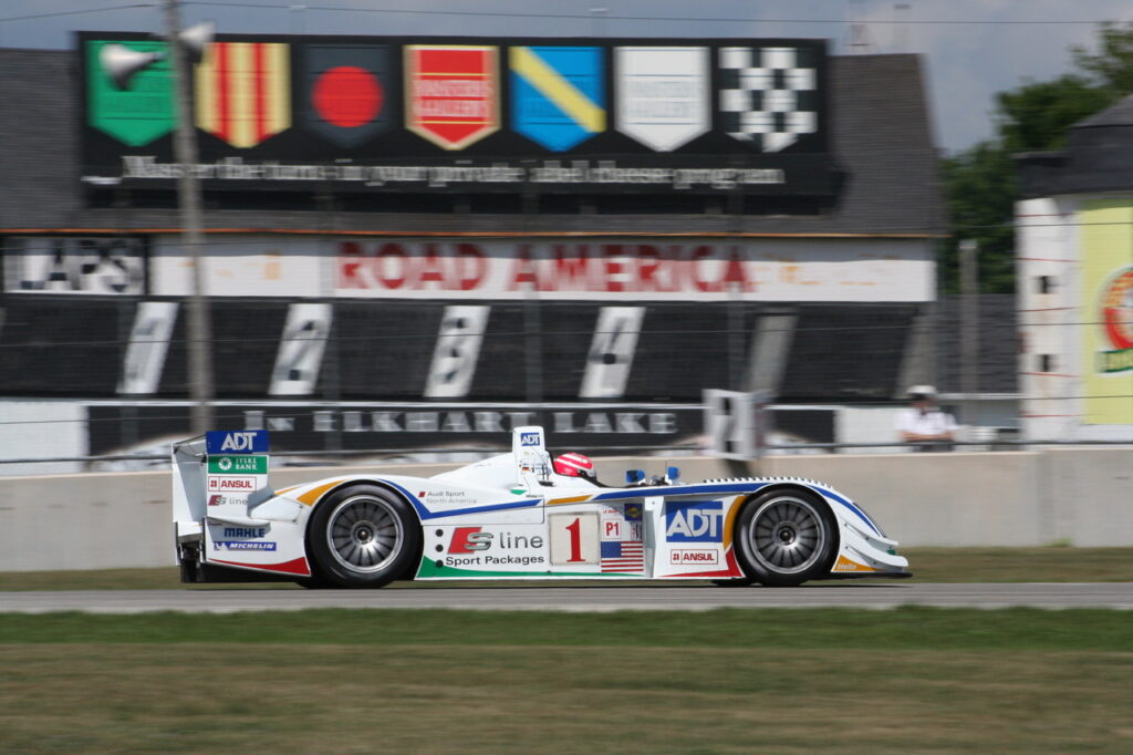 Marco Werner in the Champion Audi R8 going past the old barn. [Photo by Jack Webster]